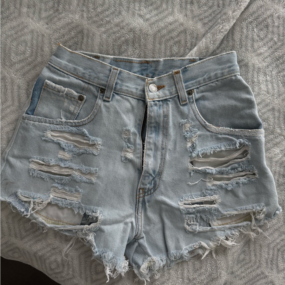 Levi’s Distressed Light Blue Denim Shorts